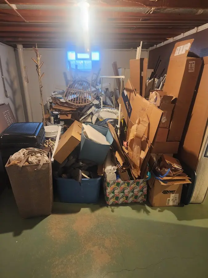 Roll-off dumpster container at job site for 2 Yard Dumpster Rental in Maynard